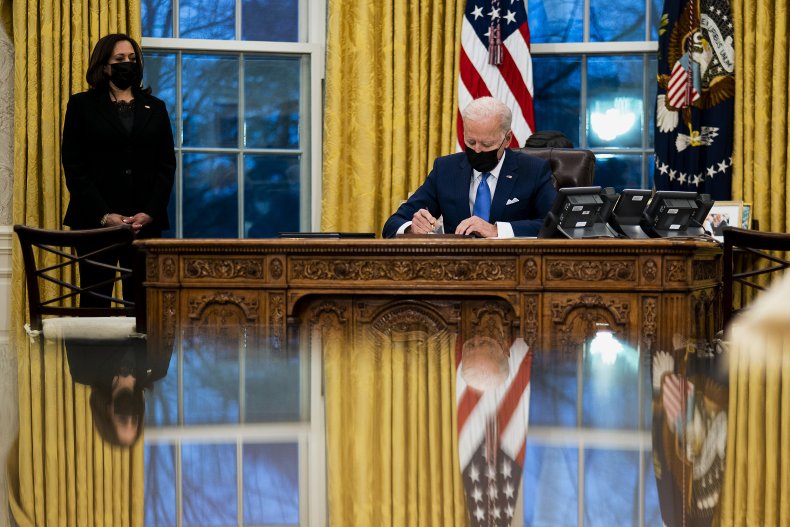 Biden working in the Oval Office Harris