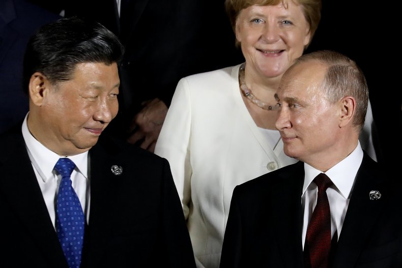 angela-merkel-vladimir-putin-xi-jinping.jpg