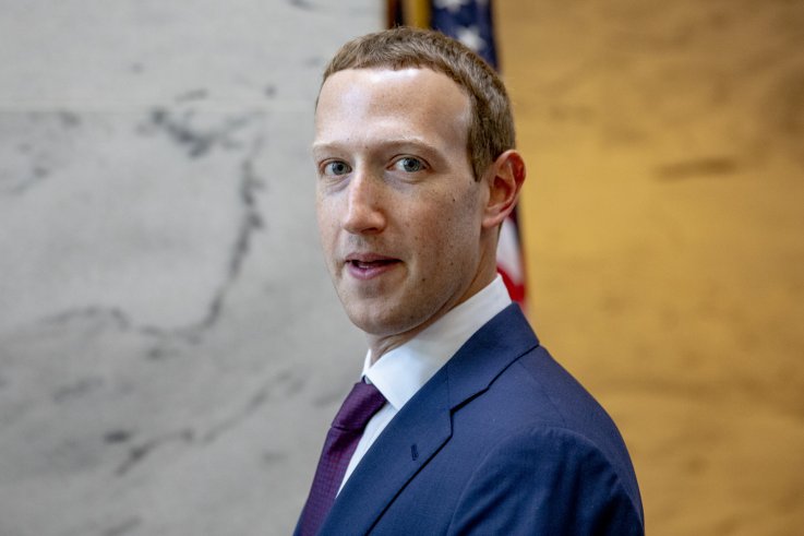 Mark Zuckerberg leaves a meeting with Senator 