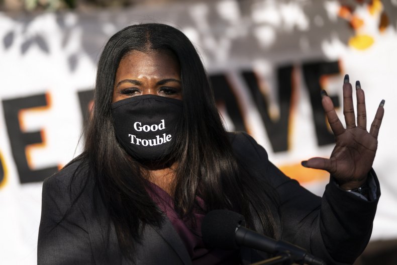 Representative Cori Bush wearing a face mask