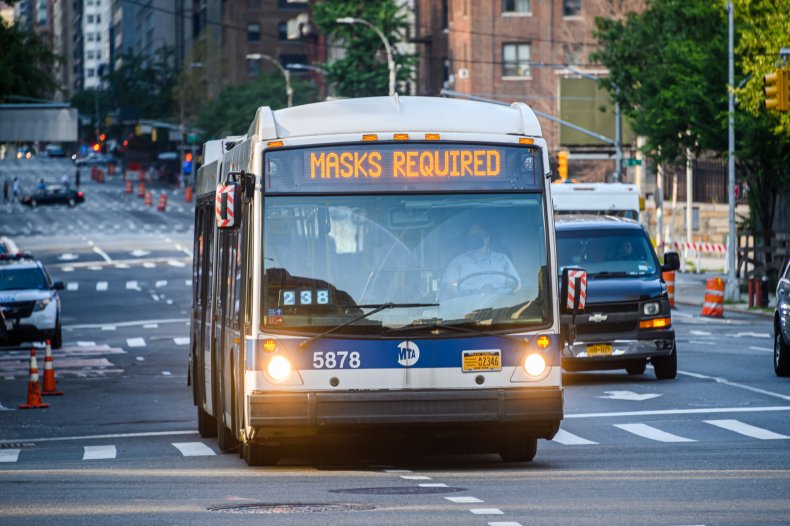 An MTA Bus Displays 'Masks Required' 