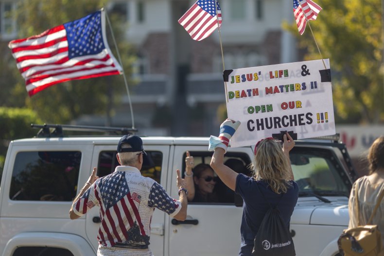 Church activists holding sign