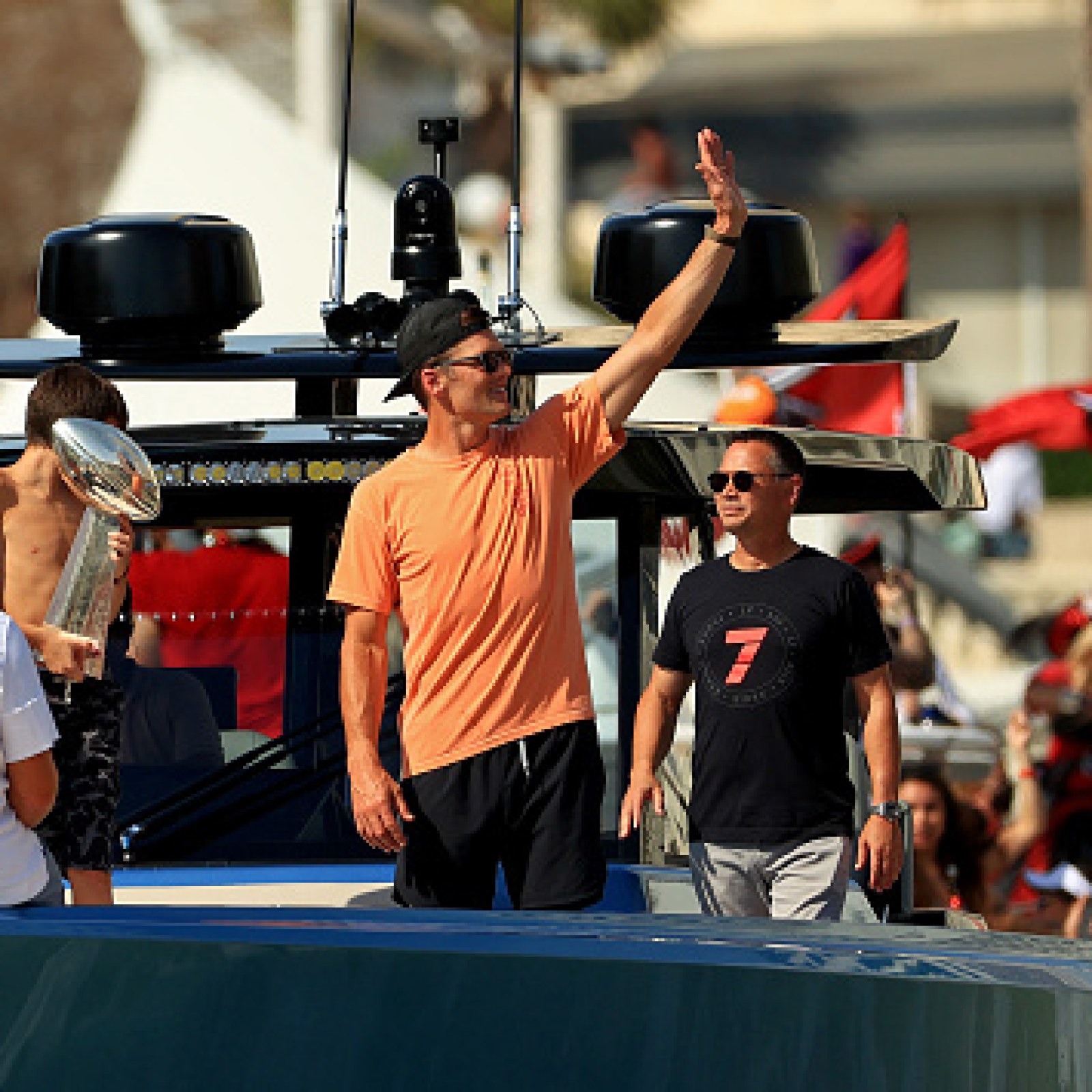 Tom Brady Tosses Super Bowl Trophy From Boat to Boat During Victory Flotilla