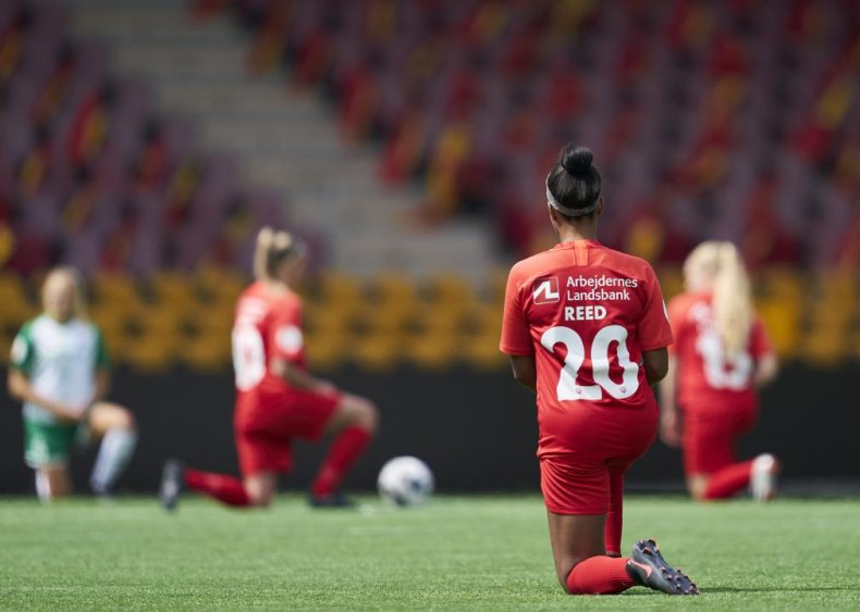 Soccer players kneel in solidarity in Denmark
