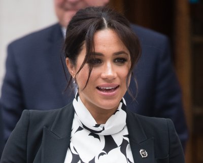 Meghan Markle Pregnant at Interntaional Womens Day Meghan Markle Pregnant at Interntaional Womens Day