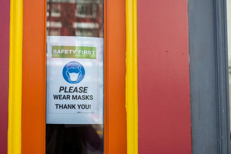 Mask sign in store