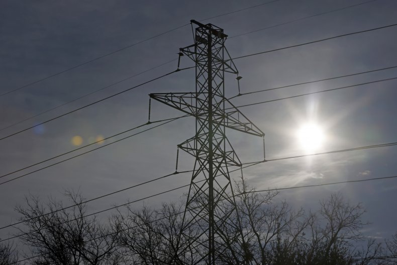 Transmission towers support power lines above the