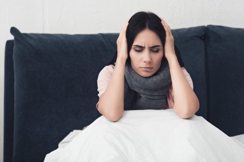 <a href="https://depositphotos.com/category/textures-backgrounds.html">Sick young woman sitting in bed