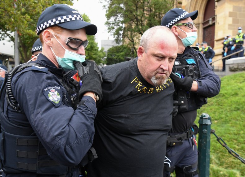 Australia police detain Proud Boys supporter protest