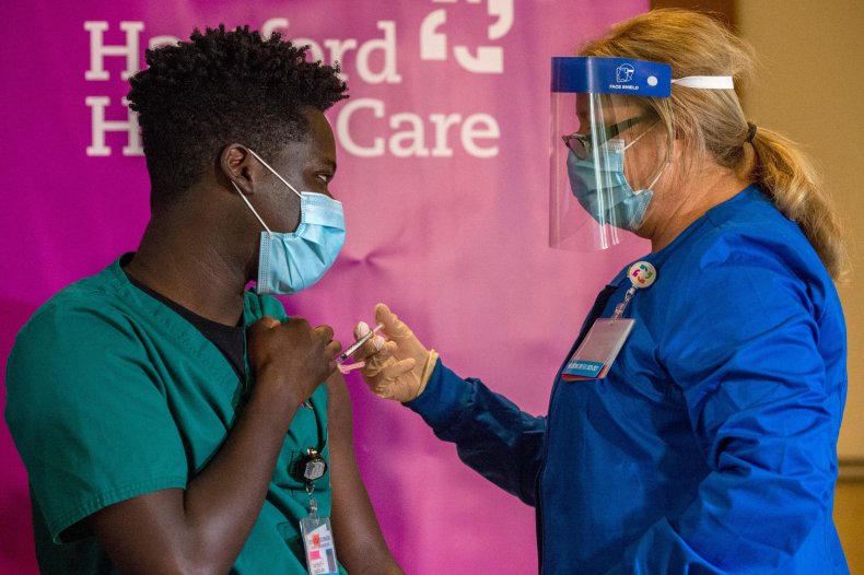Person receiving a COVID vaccine