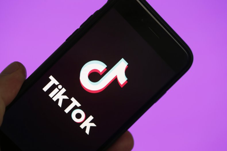 Logo TikTok on phone screen