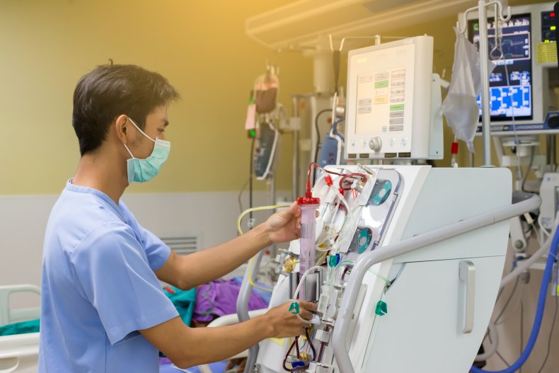 Nurse setting up equipment