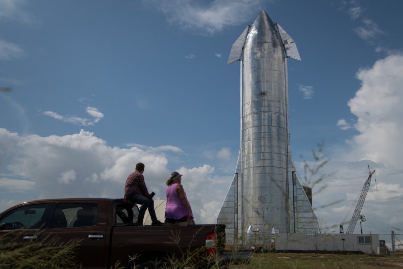 People look at Starship rocket