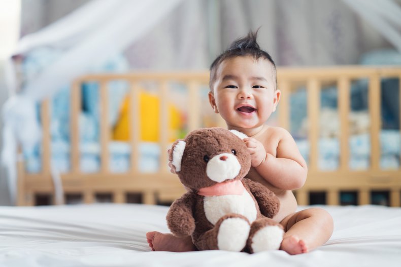 Baby and teddy bear 