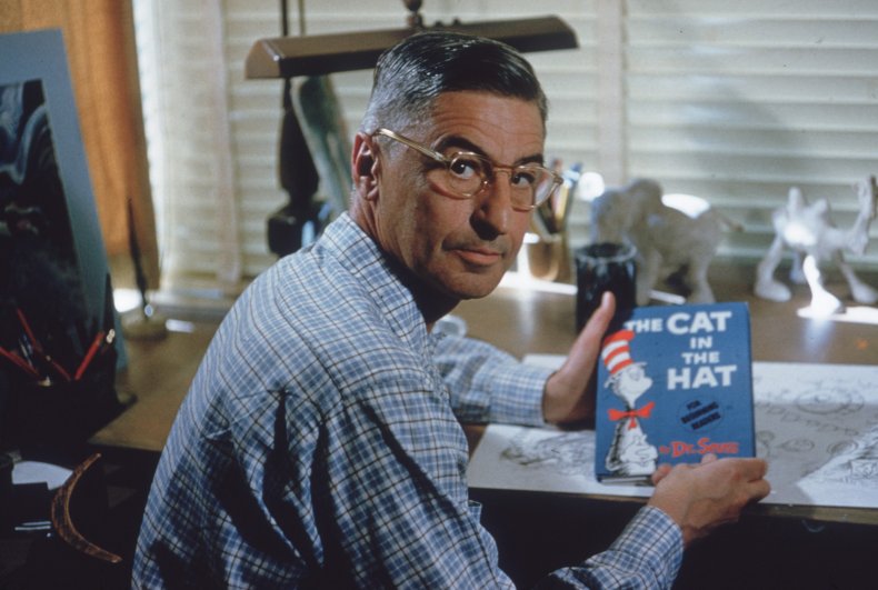 Dr. Seuss holds "The Cat in the