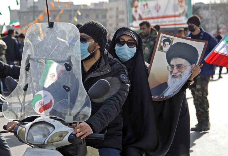 Iranians pictured on freedom day in Tehran