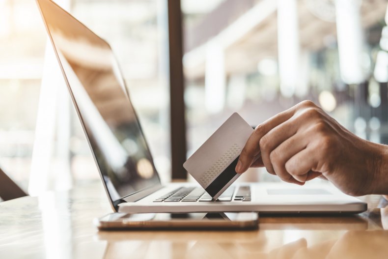 Credit card by laptop