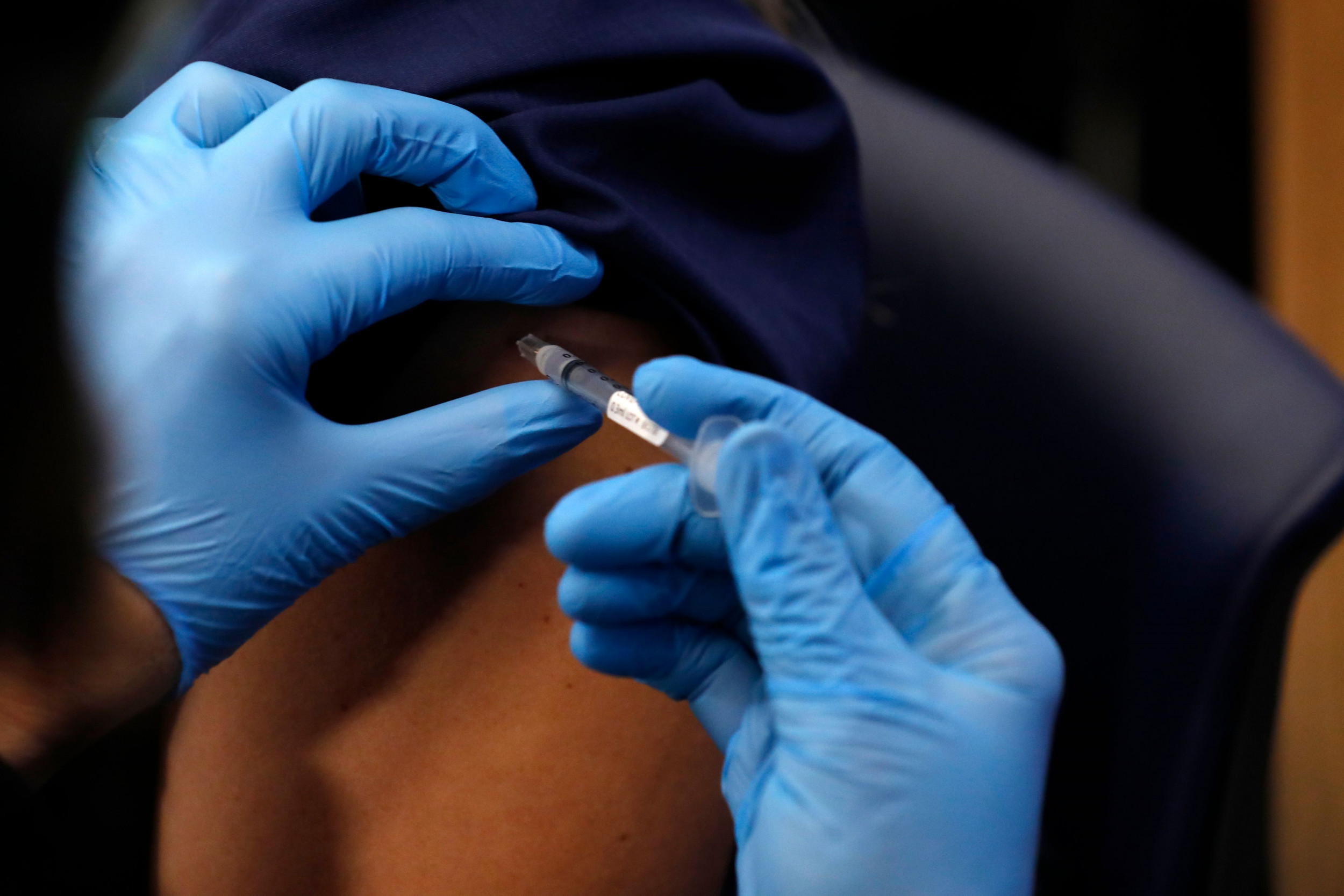 Michigan, Alaska to give COVID vaccines to all adults well ahead of Biden’s May 1 pledge