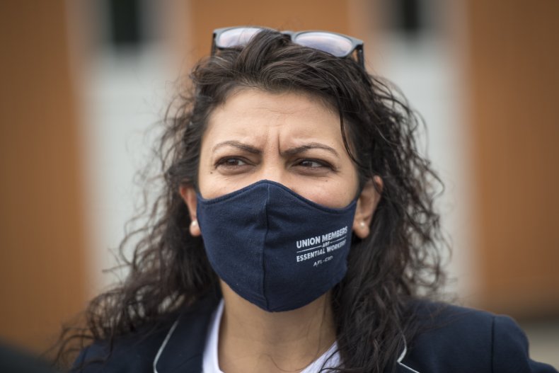 Representative Rashida Tlaib looks on before Democratic