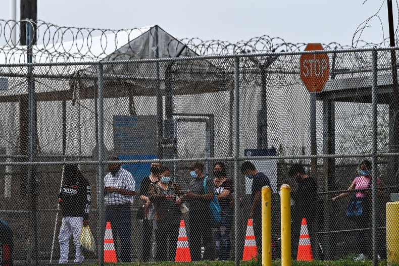 Migrants mostly form Central America wait in