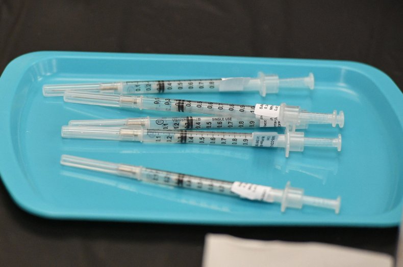 Syringes of Pfizer-BioNTech vaccine at a Covid-19 