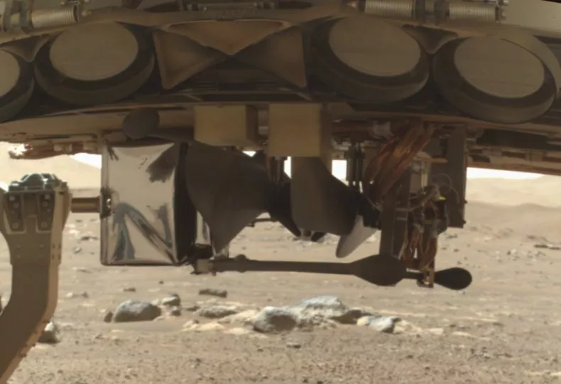 Ingenuity stowed onboard the Perseverance rover on the surface of Mars (NASA)