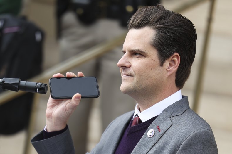 Gaetz listens to Donald Trump Jr.