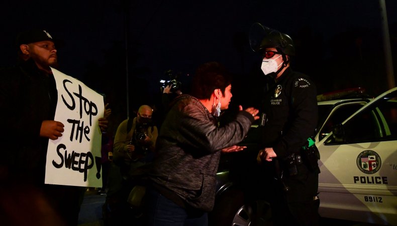 LAPD face off with homeless protesters