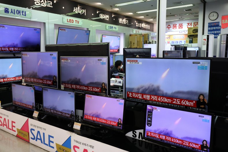 TVs show north korean missile launches Seoul