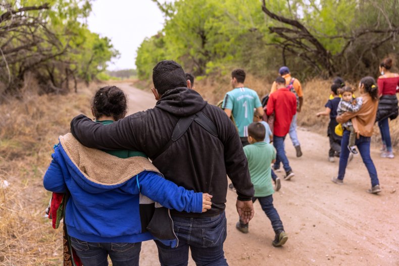Migrants crossing border