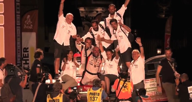 Philippe Croizon celebrates after Dakar Rally