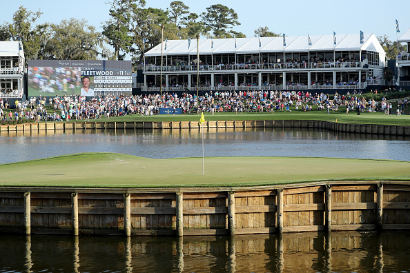 Watch Hall of Fame WR Tim Brown Drills Hole-in-One at Famed TPC Sawgrass 17th