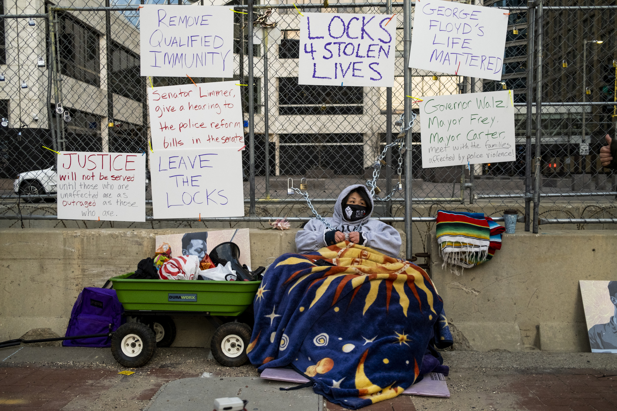 Teacher Seeks Justice for George Floyd, Chains Herself to Fence Outside Derek Chauvin Trial