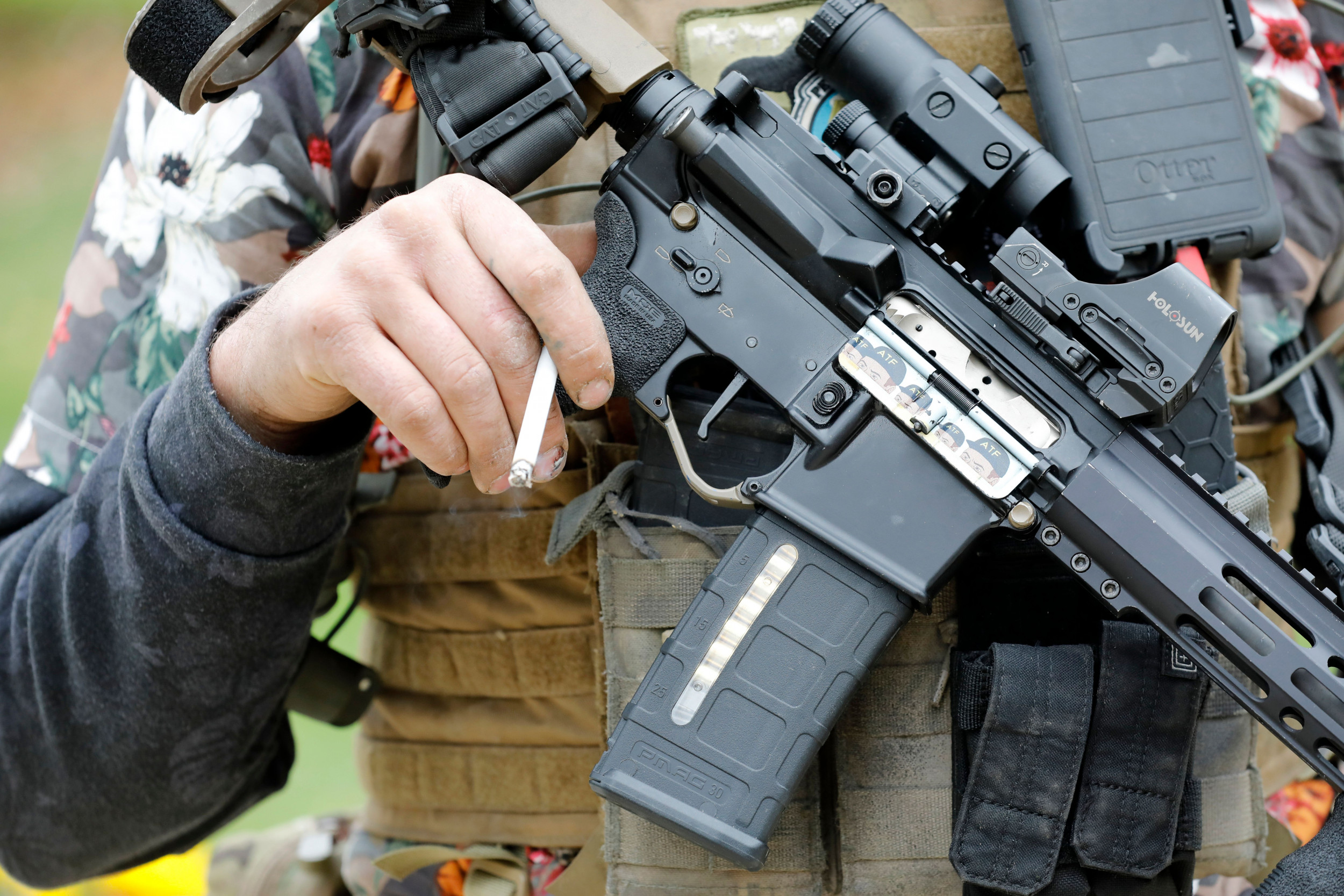 Man confronts armed far-right militia in video: 'get your guns outta here'