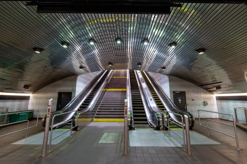 Woman Trapped in Shopping Mall Escalator Robbed by Pretend Rescuer