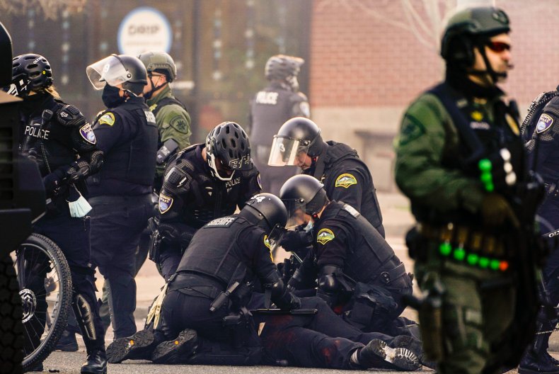 Police detain Antifa protester in Olympia, Washington