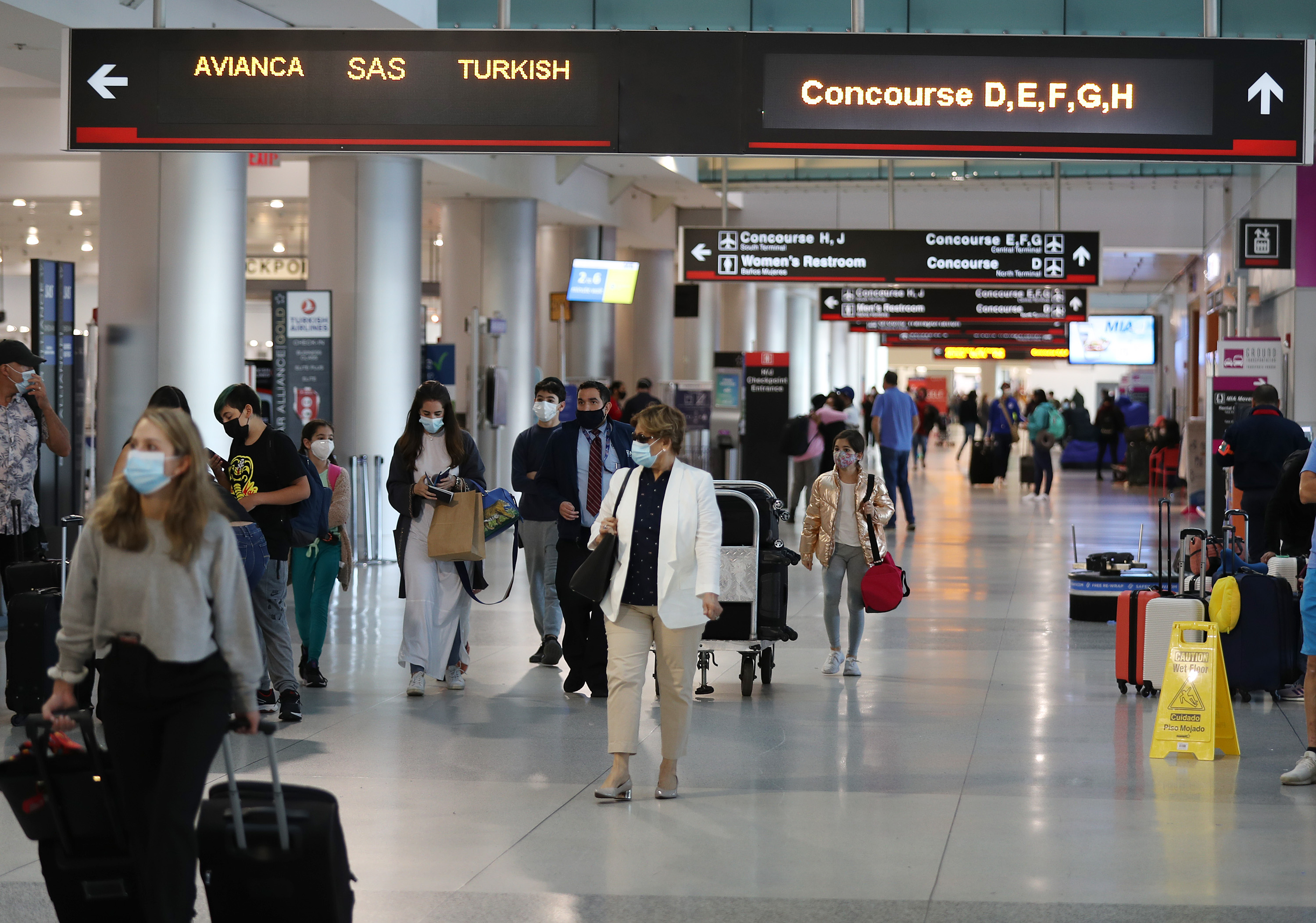 Video Shows Two Violent Brawls at Miami International Airport: 'Stop!  You're Going to Kill Him'