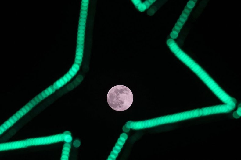 Pink moon seen over Nasiriyah in Iraq
