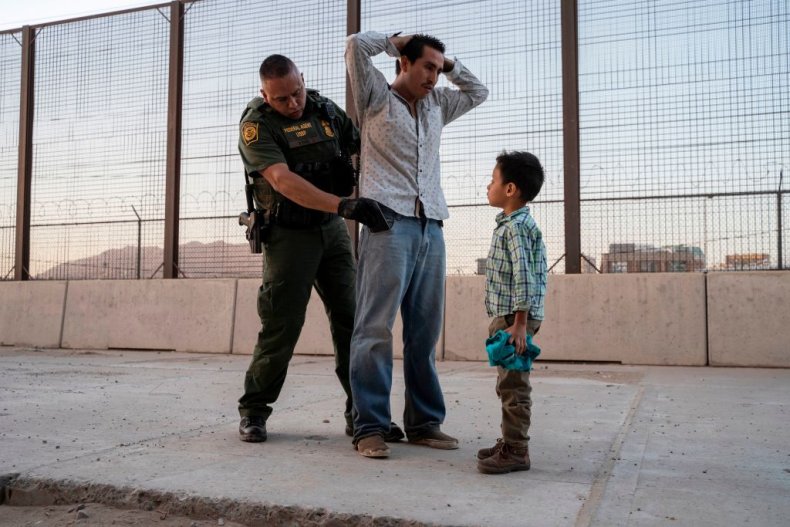 Migrant father and son