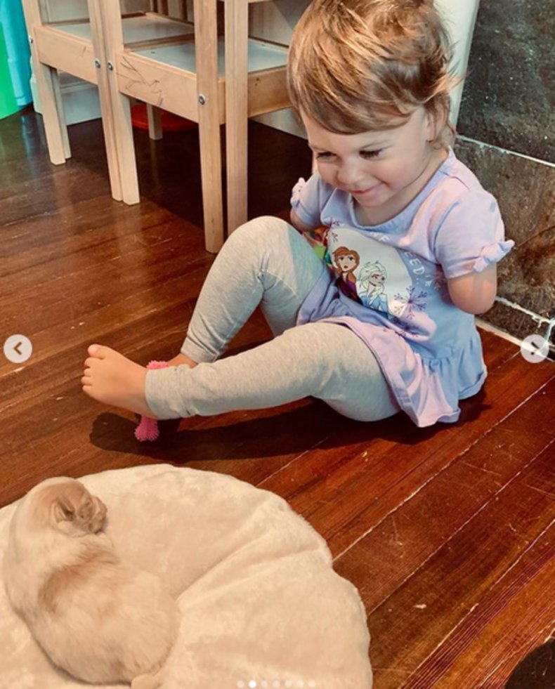 Ivy McLeod and her new puppy.