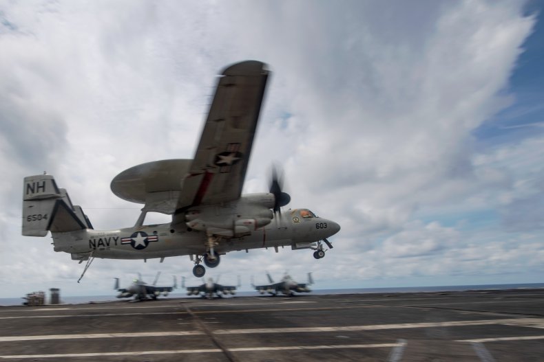 U.S. Reconnaissance Plane Lands On Carrier