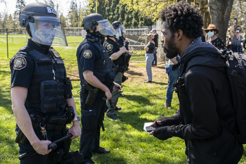 Protester Argues With a Portland Officer