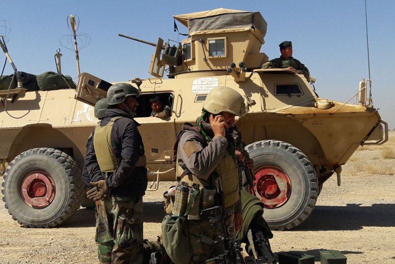 Afghan forces fight Taliban