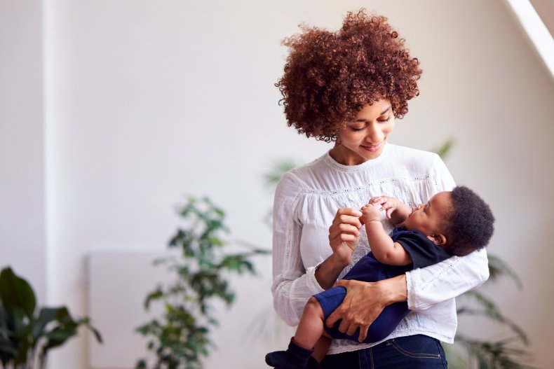 Mother holding her baby