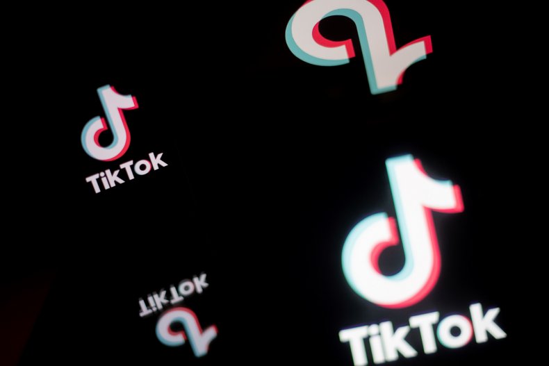 Smartphone displays TikTok logo