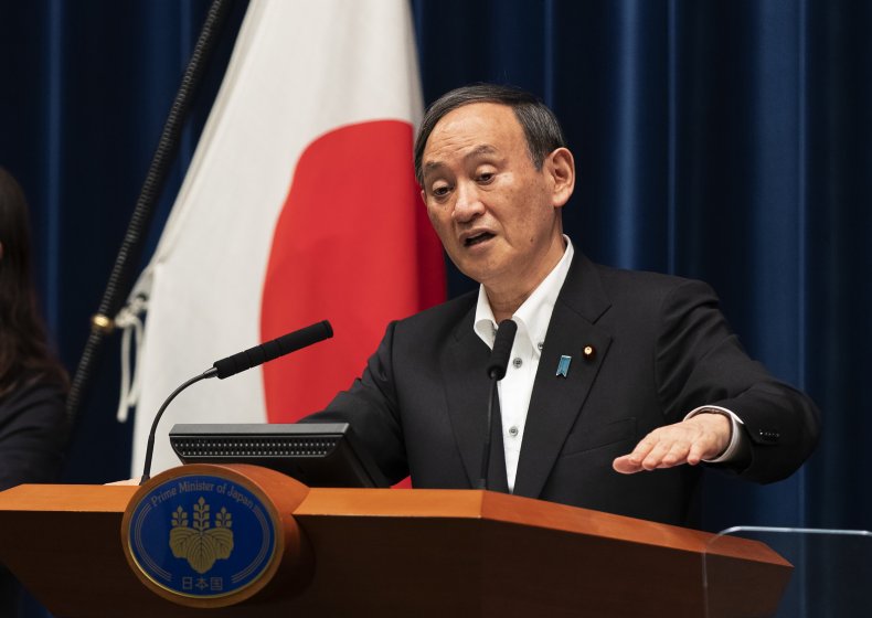 Japanese Workers Ignore Government Request to Work Remotely,
Return to Office 1 Japanese Prime Minister Yoshihide Suga