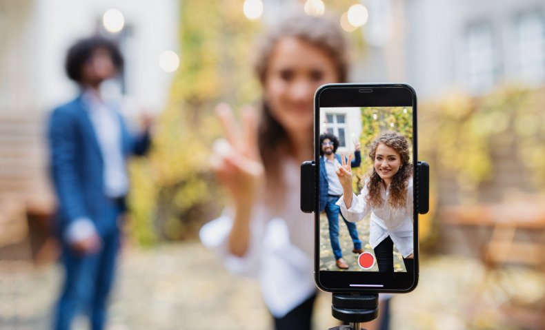 Couple making video with a smartphone