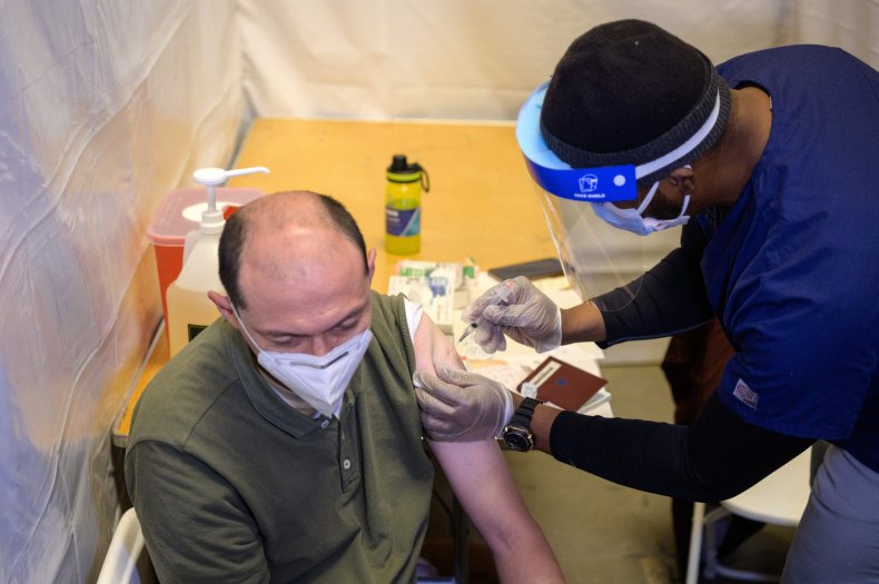 A Man Receives COVID-19 Vaccine