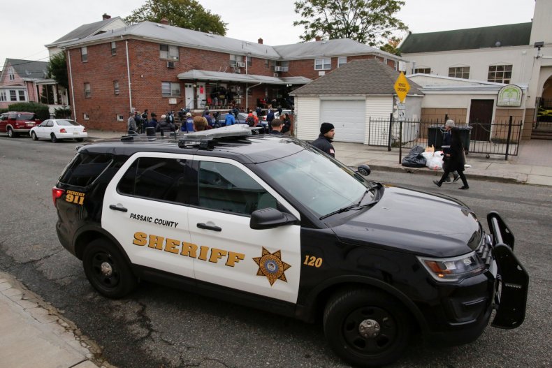 A police SUV parked on a street.
