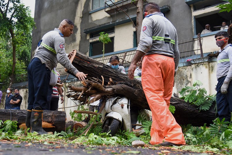 Firefighters Help Clear Debris